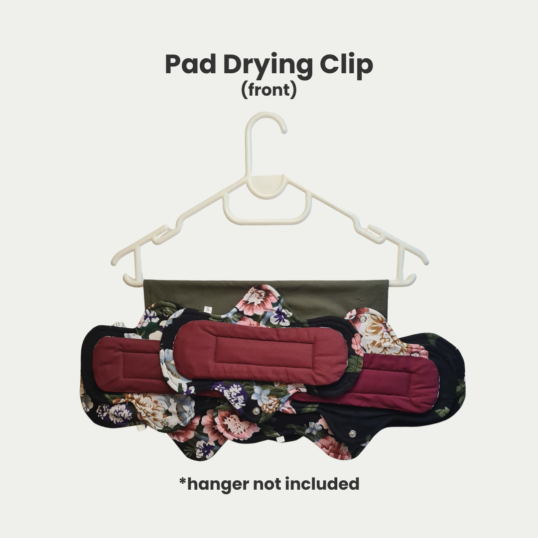 womb wellness pad drying clip in use front womb wellness pad drying clip in use front